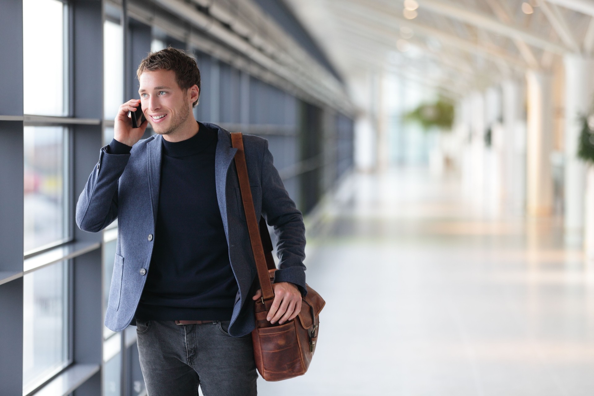 Urban business man talking on smart phone